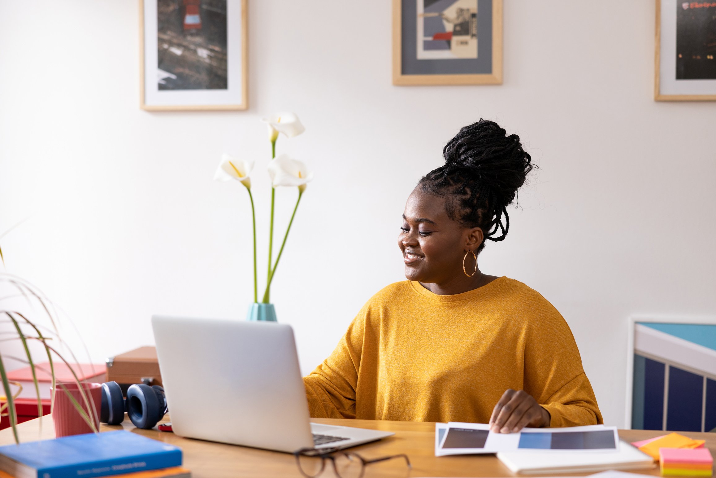 Young black female entrepreneur working from home